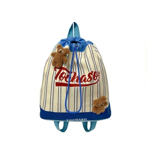 Striped drawstring school backpack for kids with cute plush bear charms and red logo