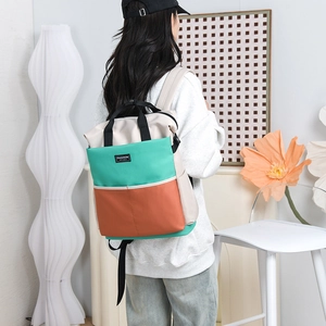 Stylish tricolor diaper backpack with large capacity and multi-pocket for moms