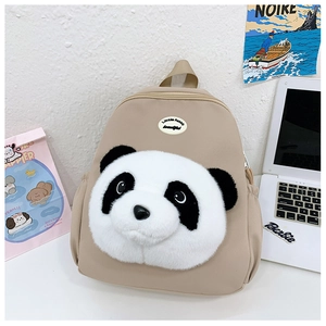 Detail of beige nylon backpack with cute 3D plush panda head and woven top handle