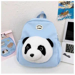 Close-up of cute panda plush head detail on light blue kids backpack with fuzzy texture