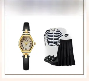 Detail of Gedi vintage tonneau watch with gold hexagonal case and black leather strap