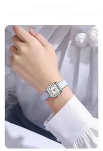 Elegant ladies quartz watch with lavender leather strap and silver rectangular dial