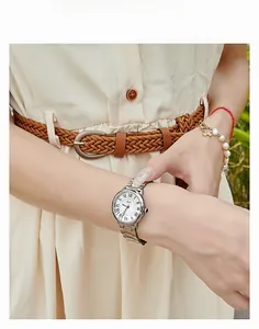 Classic silver ladies watch with blue hands and roman numerals shown on model wrist