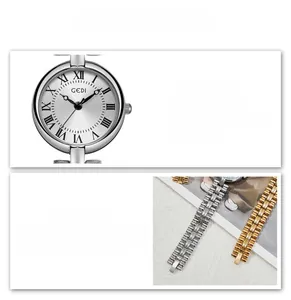 Macro detail of GEDI vintage watch featuring roman numerals and two-tone metal chain strap