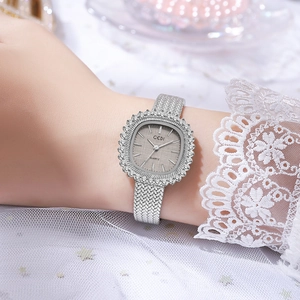 Reloj de cuarzo GEDI plateado de lujo con bisel de diamante y correa de malla