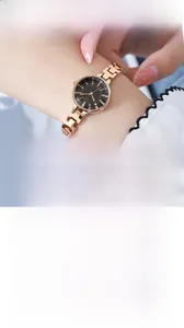 Detail of GEDI women's watch with rose gold mesh strap and minimalist black dial