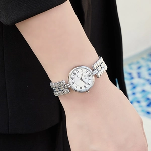 Vintage GEDI women watch with silver stainless steel band and white Roman numeral dial