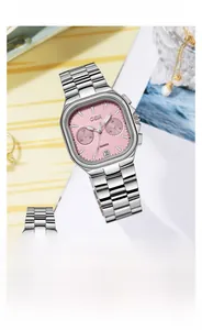 Detail of 39mm square steel watch showing pink dial, date function, and subdials