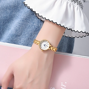 Elegant gold quartz watch for women with white Roman numeral dial and metal bracelet