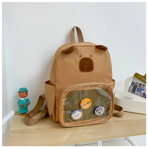 Detail of cute bear-shaped kids backpack with clear front pocket and embroidery