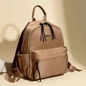 Casual Backpack For Women Large Capacity Waterproof Oxford Cloth Minimalist Fashion Travel School Daypack Metal Letter