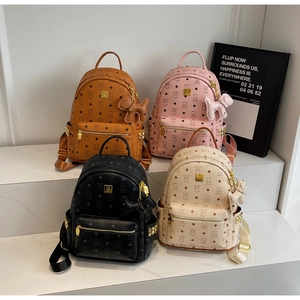 Detailed display of four cute cartoon backpacks in brown pink black and cream colors