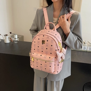 Pink PU leather backpack with cartoon bear print and adjustable straps for women