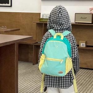 Kids color-block backpack in mint green and yellow with large capacity for school