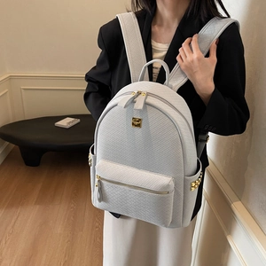 Minimalist light grey woven texture backpack with golden hardware for women