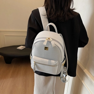 Fashionable white crocodile pattern women backpack with gold hardware for commuting