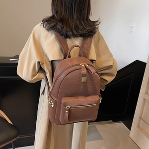 Brown crocodile pattern backpack for women with gold studs and large capacity