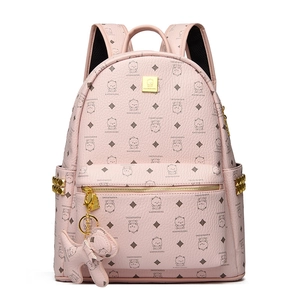 Pink faux leather backpack with bear prints and gold rivets for casual style