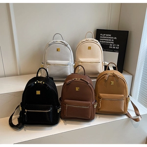 Detail of premium PU backpacks with gold hardware and luxury quilting in five colors