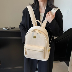 Fashionable beige diamond embossed PU leather backpack with side studs for women