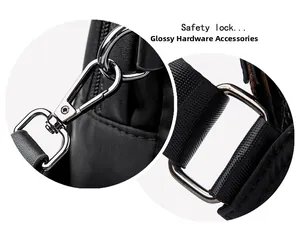 Close-up of shiny silver metal hooks and reinforced textile straps on a fashion backpack
