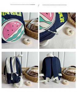 Detail view of watermelon print kids backpack with dinosaur lettering and mesh side pockets