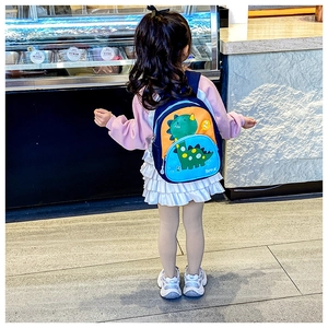 Toddler backpack featuring a cute green dinosaur with vibrant blue and orange panels