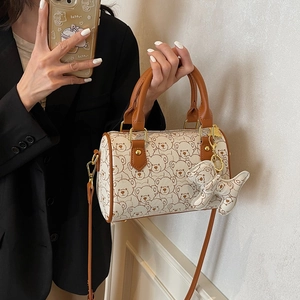 Fashionable Boston barrel bag with cute bear print and brown leather straps for women