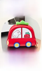 Internal view showing large storage compartments and mesh pockets of the car-shaped kid backpack