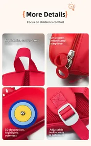 Detail view of red car-themed EVA backpack showing top handle, zippers, and adjustable buckle