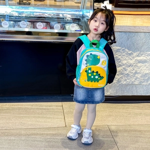 Cute cartoon dinosaur backpack for toddlers in yellow and blue with fun dinosaur print