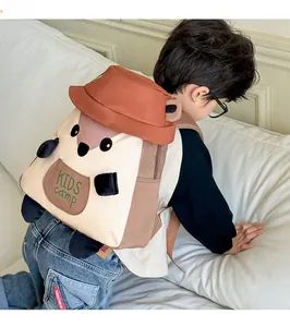 Detail of cute squirrel backpack with caramel bucket hat design and KIDS camp text
