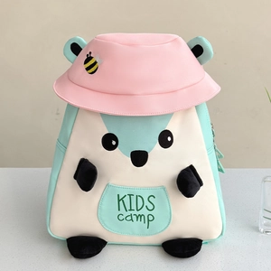 Close-up of pink kids backpack featuring 3D animal paws and embroidered sun hat detail