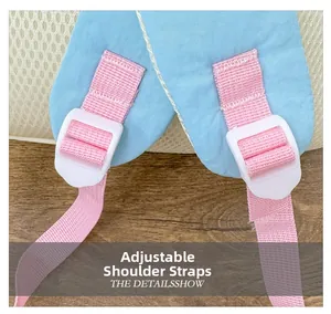 Detail view of adjustable padded mesh shoulder straps with white buckles on children backpack