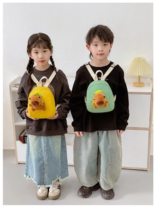 Kids mini canvas backpack featuring a cute 3D plush capybara doll in yellow and green