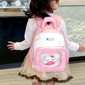 Pink and white cute cartoon schoolbag for kids with small plush cat doll in transparent pocket