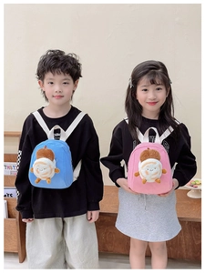 Blue and pink toddler backpacks with plush animal dolls worn by kids in a room