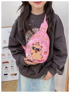 Close-up of pink children's chest bag with cartoon capybara print and adjustable strap