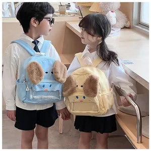 Close-up of cute cartoon dog backpack with plush ears and transparent front pocket