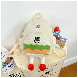Close-up of cute hamburger-shaped kids backpack with embroidery and plush layers
