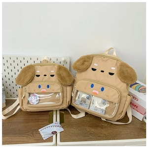 Comparison of small and large sizes for cartoon puppy backpacks with clear PVC pockets