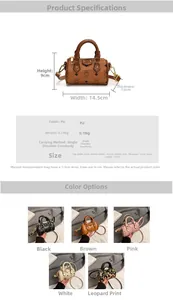 Detail showing mini bear print Boston bag with PU leather texture and gold hardware