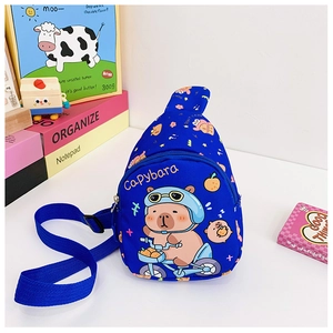 Detail of navy blue kids crossbody bag featuring cute cycling capybara cartoon print