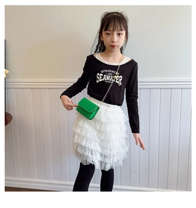 Mini green crossbody bag for children with golden metal chain strap in high detail