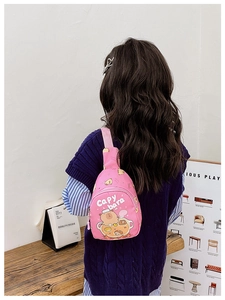 Pink cartoon Capybara crossbody chest bag shown in use on a child for daily wear