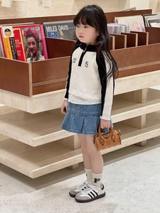 Girl's outfit featuring striped knit top, denim skirt, and mini vintage print handbag