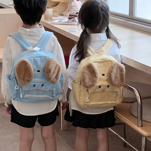 Cute cartoon puppy toddler backpacks in light blue and yellow with transparent front pockets
