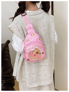 Pink Capybara cartoon crossbody bag for kids with adjustable strap shown from a back view