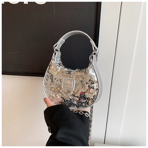 Silver sequin mini hobo bag featuring a round handle and elegant metal chain strap