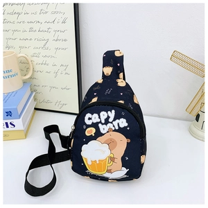Detail of navy blue Capybara chest bag showing zipper compartments and cute cartoon print